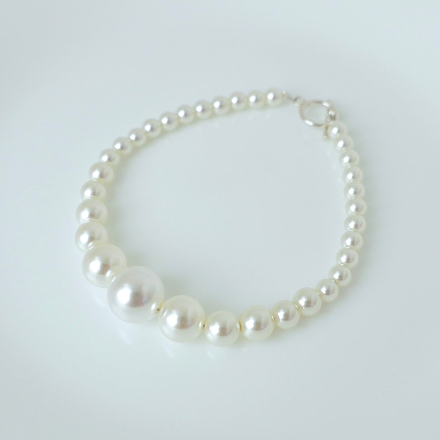 Minimalist Design Swarovski-Inspired S925 Silver 4-10mm Pearl Bracelet with OT Clasp