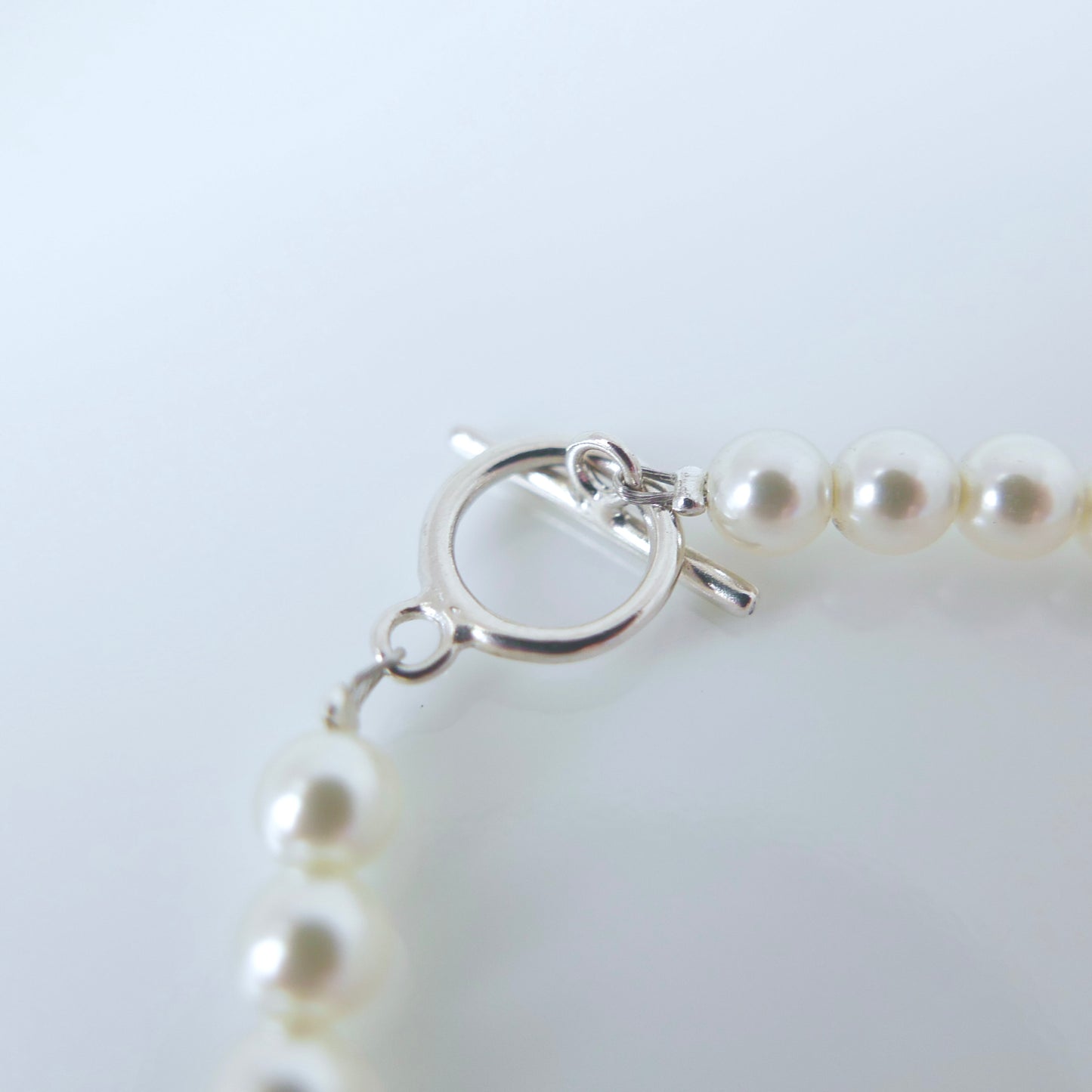 Minimalist Design Swarovski-Inspired S925 Silver 4-10mm Pearl Bracelet with OT Clasp