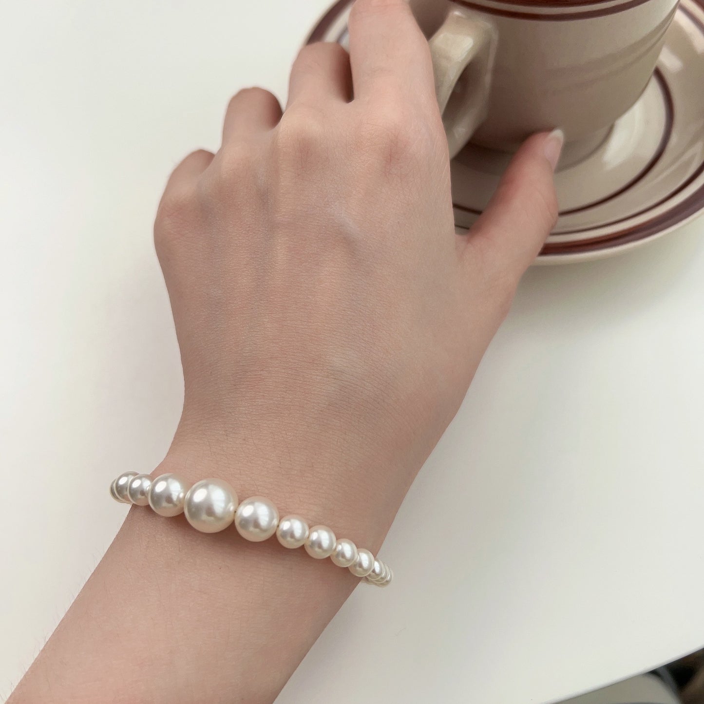 Minimalist Design Swarovski-Inspired S925 Silver 4-10mm Pearl Bracelet with OT Clasp