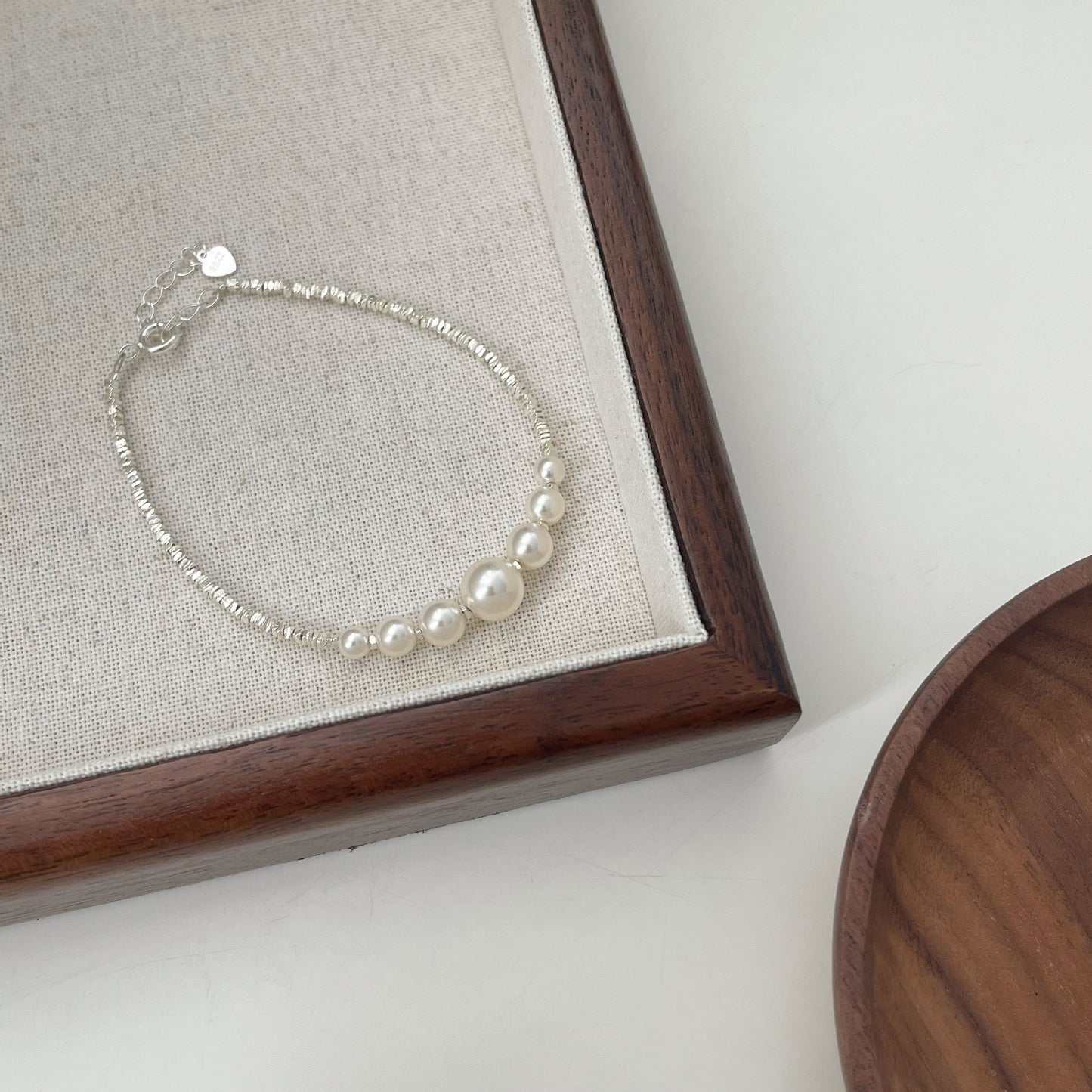 Handcrafted Silver Fragment Bracelet with Elegant Pearl Accents - Unique Luxury Design