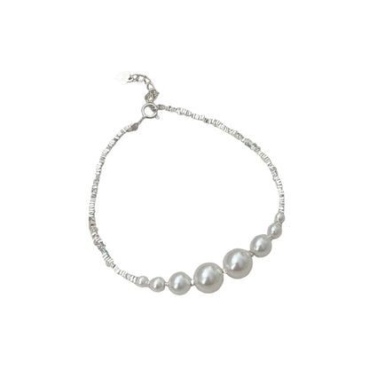 Handcrafted Silver Fragment Bracelet with Elegant Pearl Accents - Unique Luxury Design