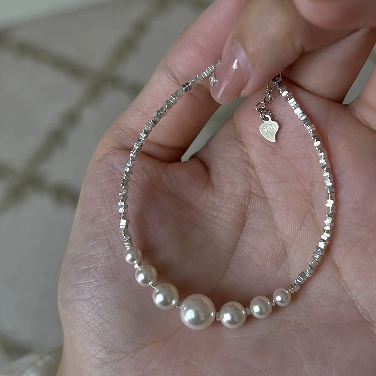 Handcrafted Silver Fragment Bracelet with Elegant Pearl Accents - Unique Luxury Design