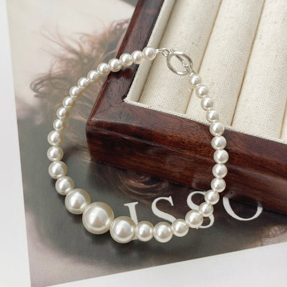 Minimalist Design Swarovski-Inspired S925 Silver 4-10mm Pearl Bracelet with OT Clasp